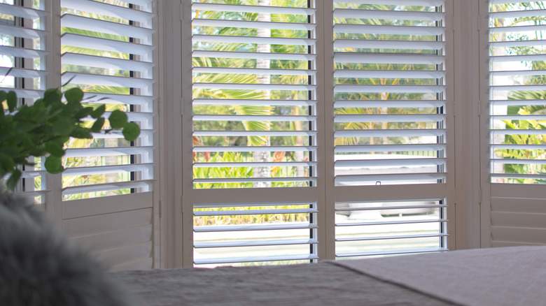 Plantation shutters in bedroom