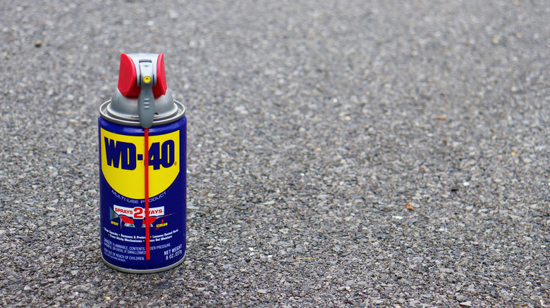 Can of WD-40 on concrete