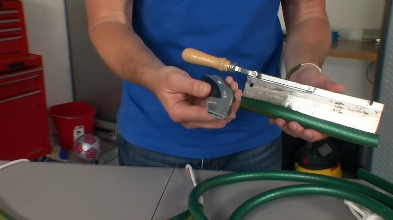 old garden hose on knife blade