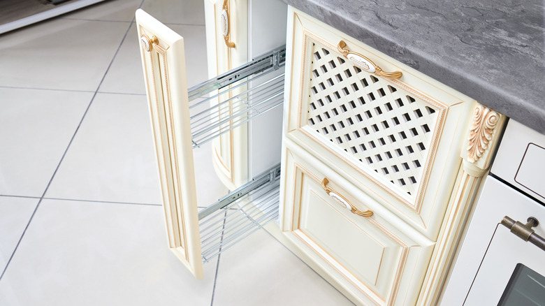 white cabinets with lattice inlay