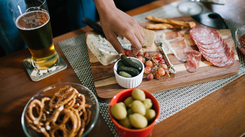 Cutting board with food on a protective liner