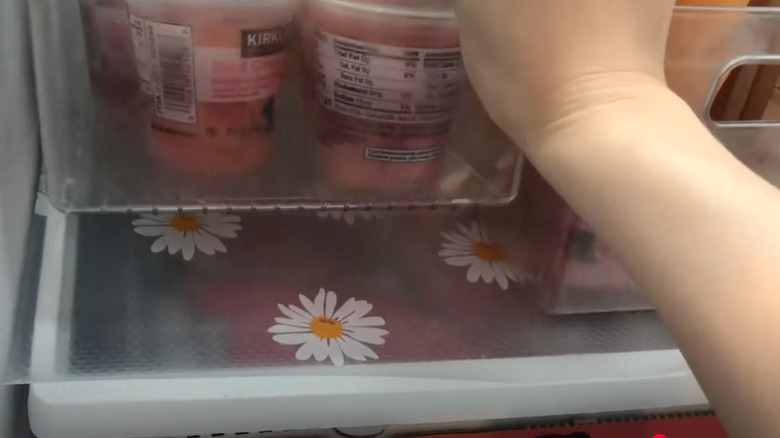 Daisy pattern clear shelf liner in refrigerator