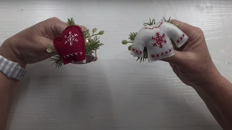 A mini holiday wreath made with napkin rings