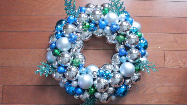 Wreath made of blue, white, and green ornaments