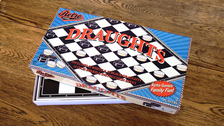 Draughts retro family board game on table