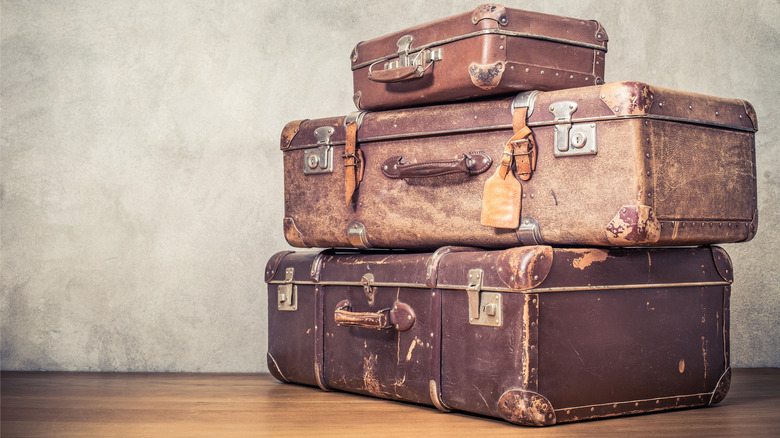 Old vintage suitcases piled on top of each other