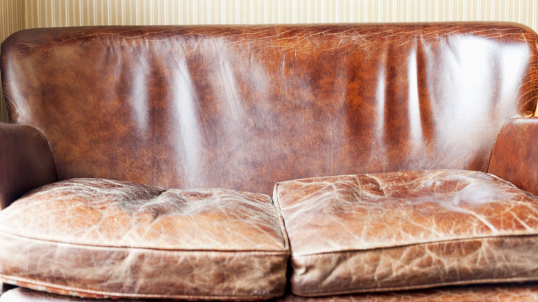 Old brown leather sofa