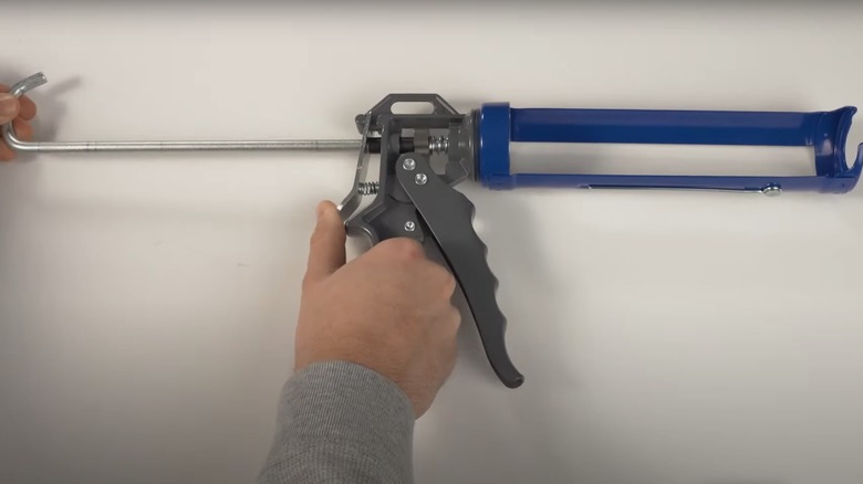 pulling tension rod caulk gun