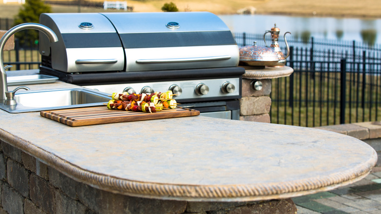 Outdoor countertop, sink, and grill