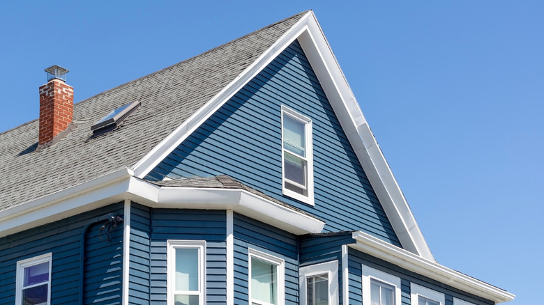 Blue house with a gray gable roof