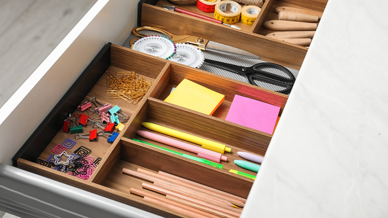 Organized desk drawer with supplies