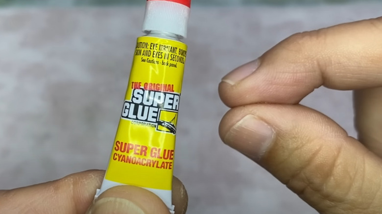 fingers stuck with super glue