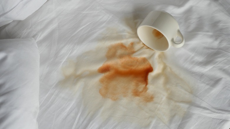 Spilled coffee on sheets