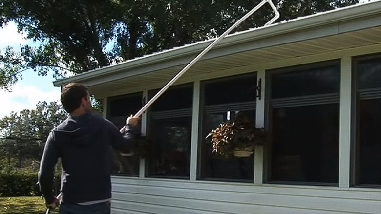 DIY gutter cleaner in action