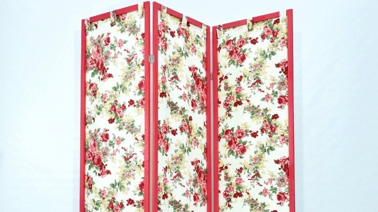 red floral fabric divider white background