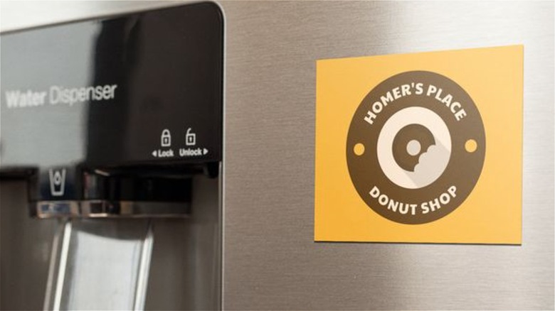 promotional magnet on fridge door