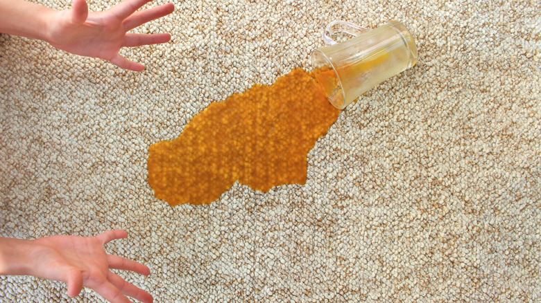 Spilled orange juice on rug