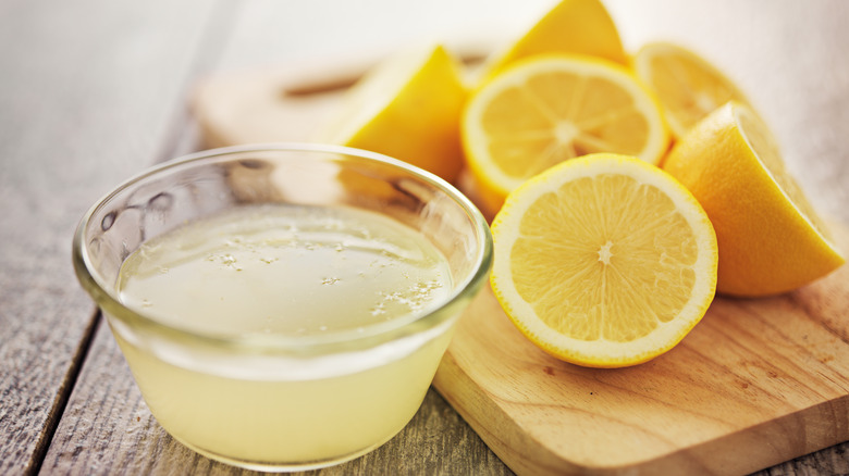 Lemons and lemon juice bowl