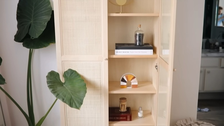 Cabinet with woven cane doors