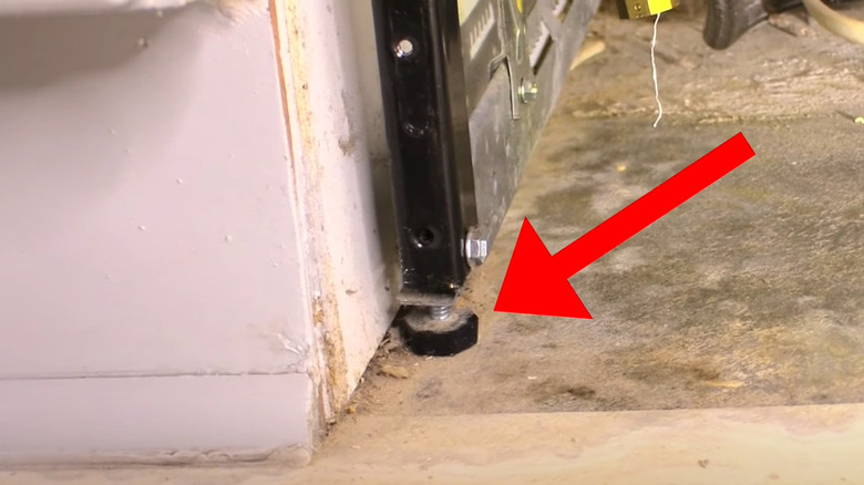 arrow pointing dishwasher leveling foot