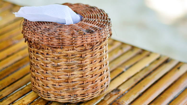 A wicker tissue box