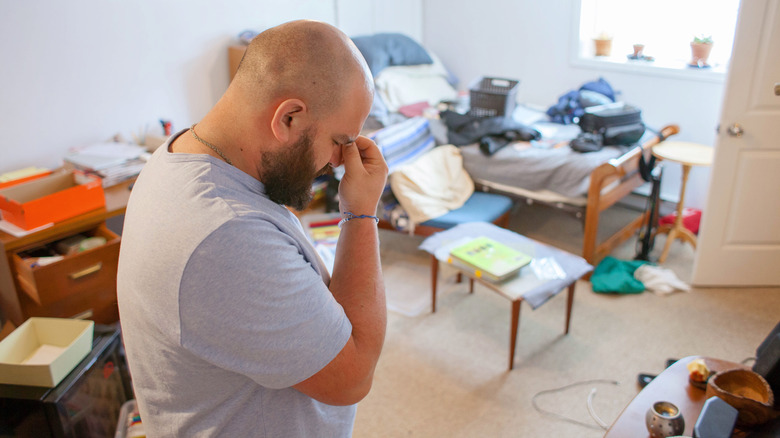 Someone who is frustrated with their messy basement