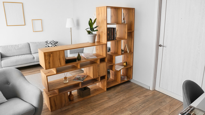 Modern wood bookshelves used as a room divider