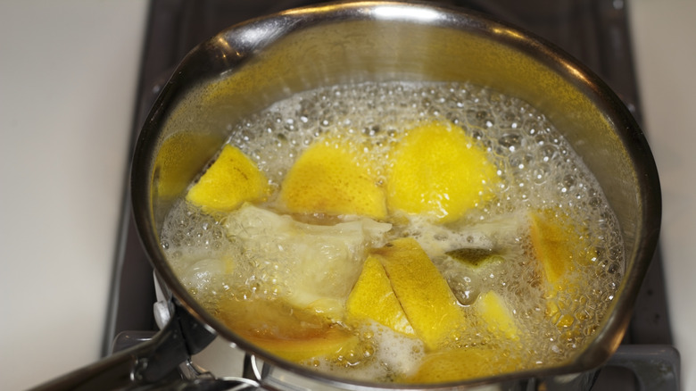 Lemons boiling in pot