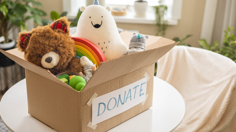 Toys in a donation box on top of a table