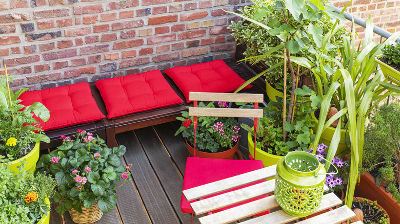 bright red cushions on balcony