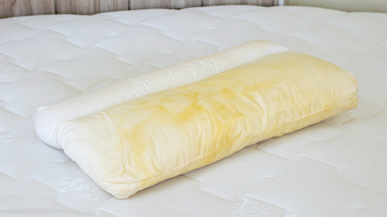 Pillow with yellow stains