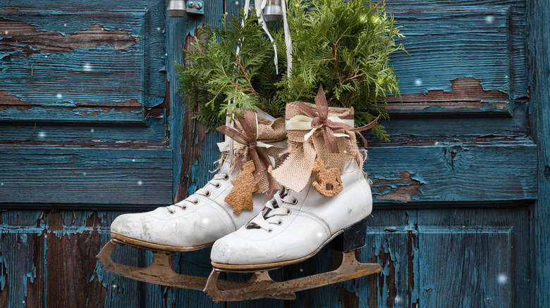 vintage ice skates and greenery 