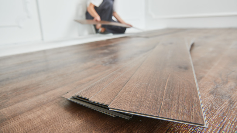 vinyl plank flooring being installed