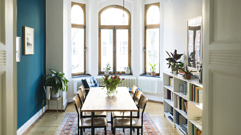 Stylish dining room with large windows