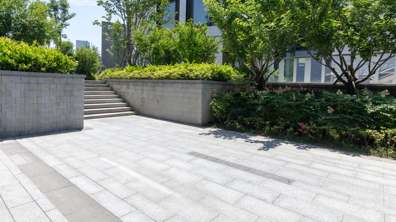 Gray pavers installed in front of a home