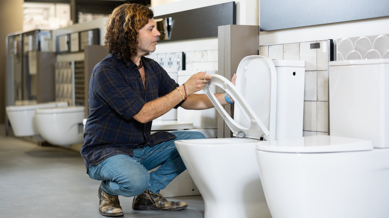 person buying a toilet seat