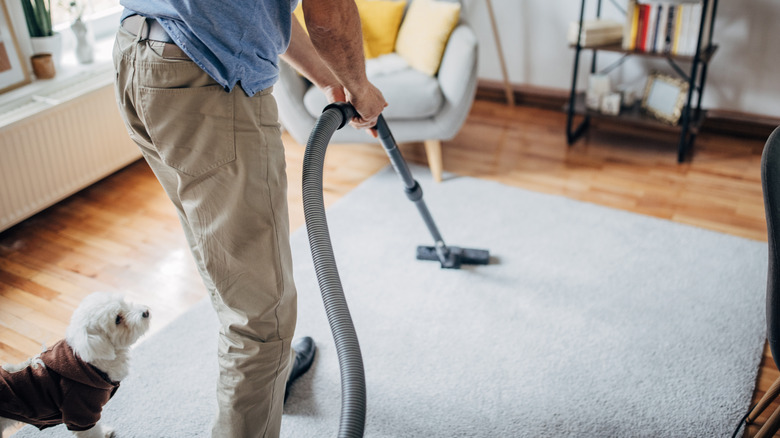 Man vacuuming