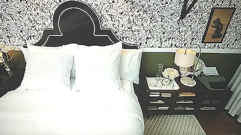 Guest room with velvet headboard