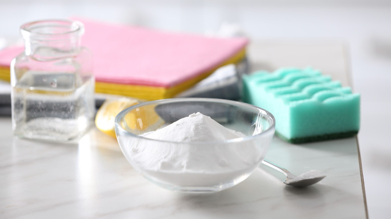 Baking soda and cleaning supplies