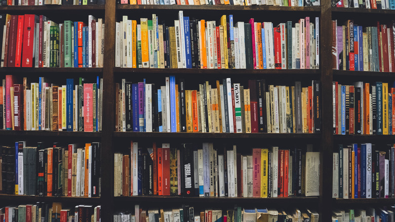 Filled bookshelves in a library