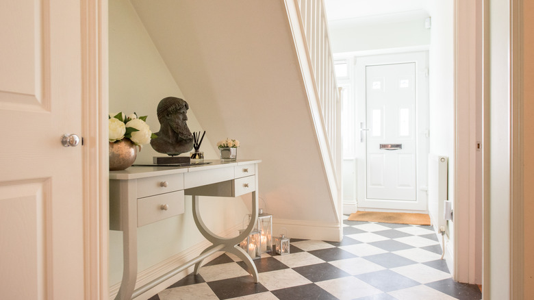 Entryway with checkerboard floors