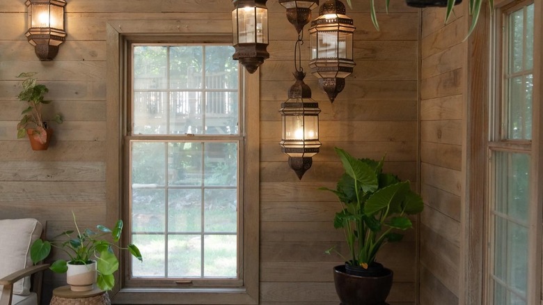 room with lanterns and wood paneling