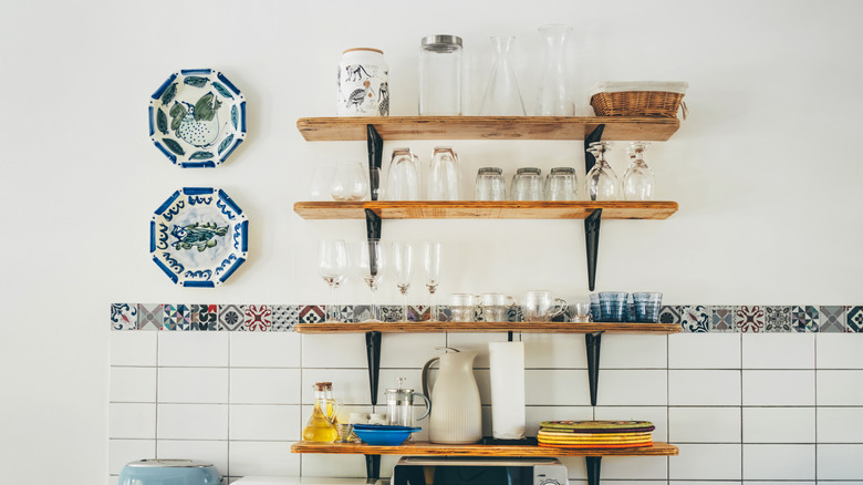 Open floating shelves in kitchen