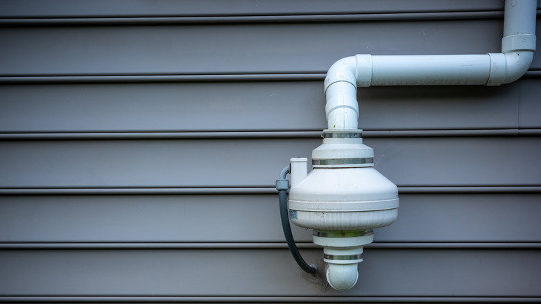 radon mitigation fan on house