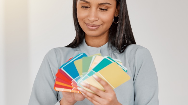 Woman looking at color swatches