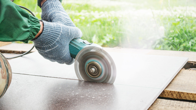 Cutting tile with an angle grinder