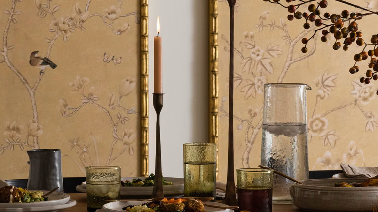 Copper candlesticks on a set table