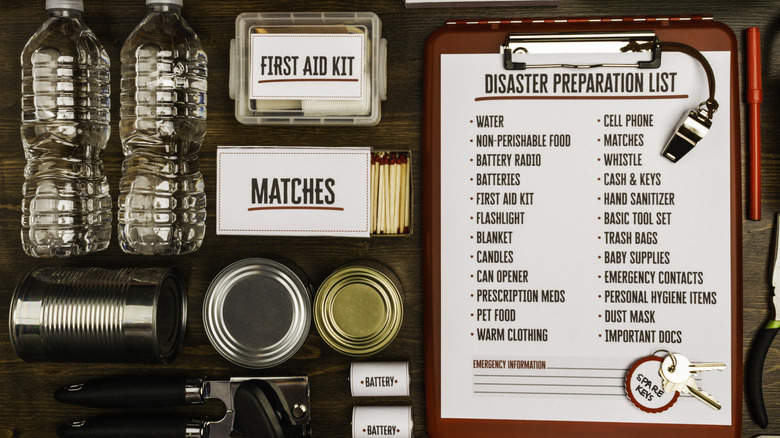 Emergency kit supplies and checklist laid out