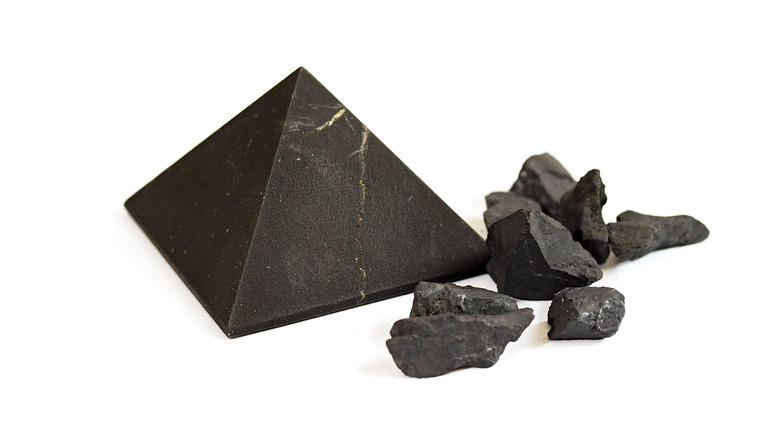 Shungite pyramid and stones