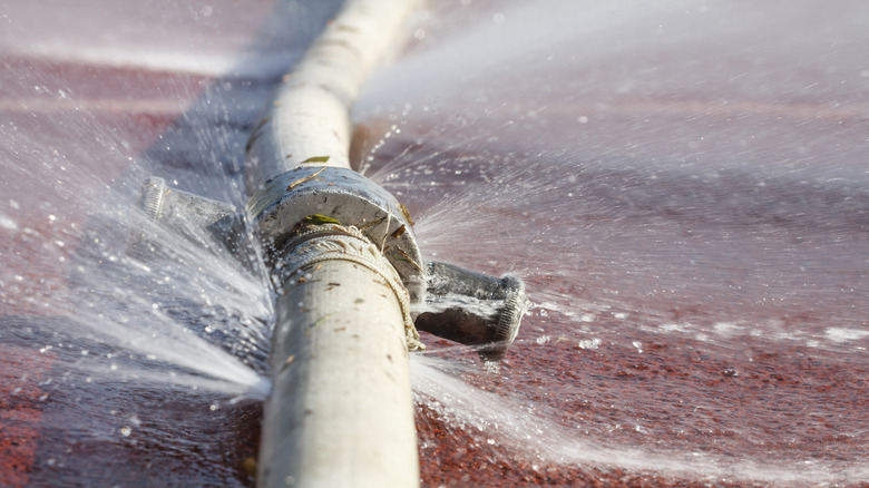 Water bursting through a pipe